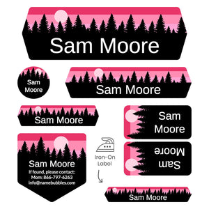 overnight camp labels of various shapes and sizes with forest silhouette and sky design