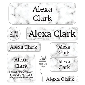 personalized name labels of various shapes and sizes with white marble background