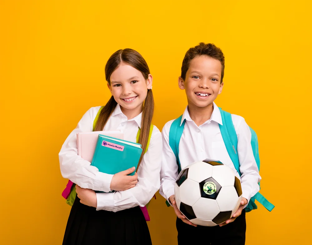 kids in school with name bubbles labels