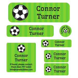 a mix of dishwaster and laundry safe labels featuring a soccerball on a striped green background