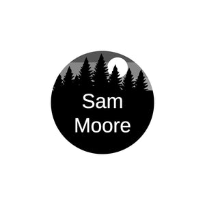 circle iron-on name labels with forest silhouette and sky design