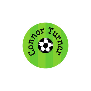 iron-on labels featuring a soccerball on a striped green background